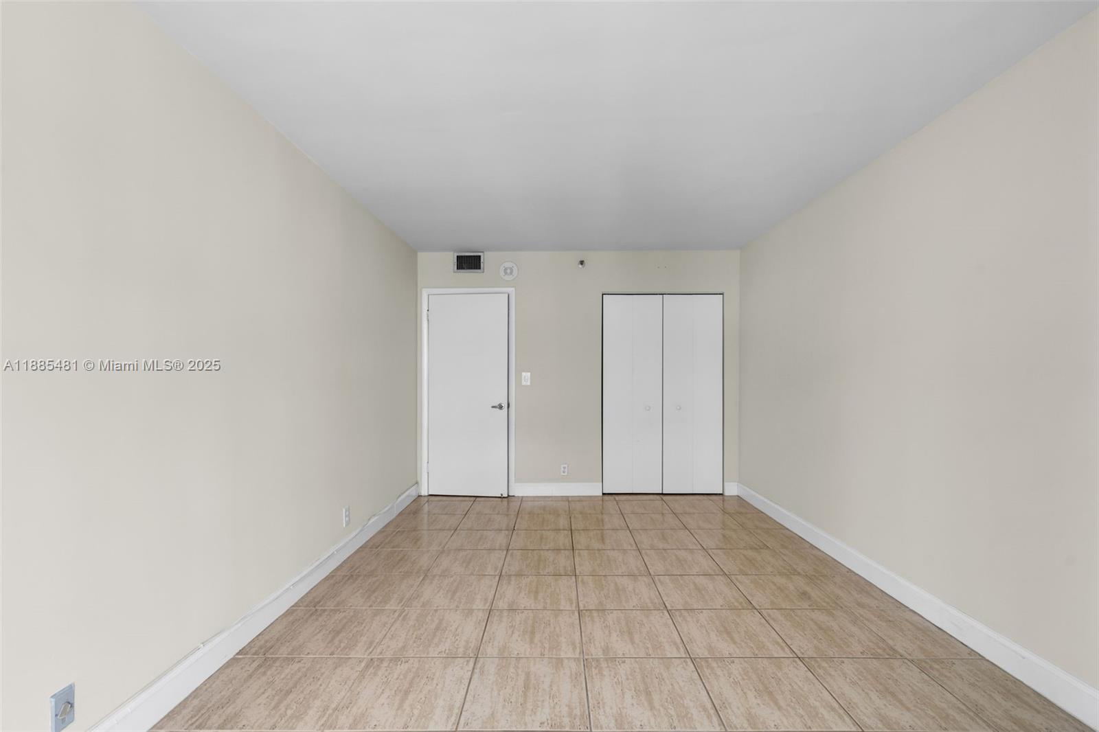 8877 Collins Avenue, Unit 303 Surfside, FL 33154 - Photo 19 of 25 a view of room with hardwood floor