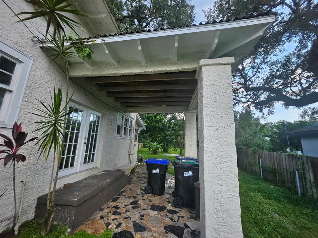 6404 Matchett Road Orlando, FL 32809 - Photo 13 of 20 a view of a porch with a yard