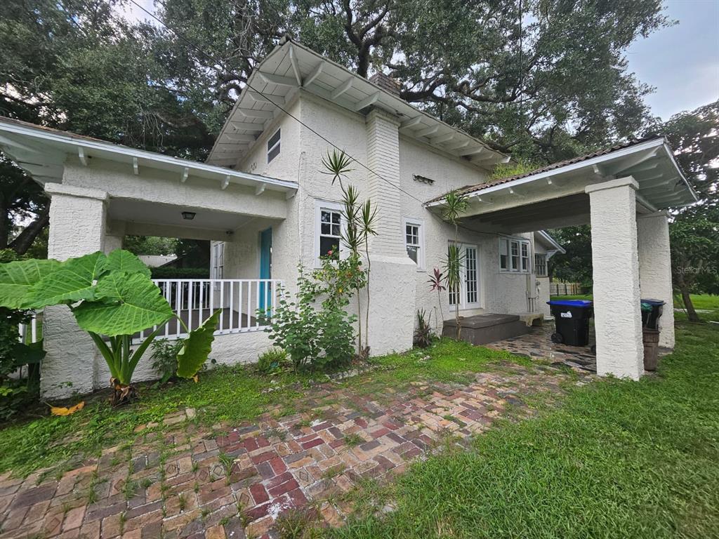6404 Matchett Road Orlando, FL 32809 - Photo 15 of 20 a view of a house with a yard and plants