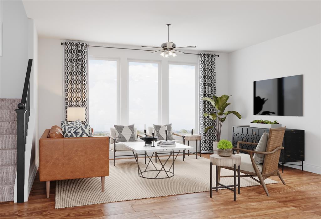 8720 Treeline Parkway Justin, TX 76247 - Photo 11 of 17 a living room with furniture and a flat screen tv