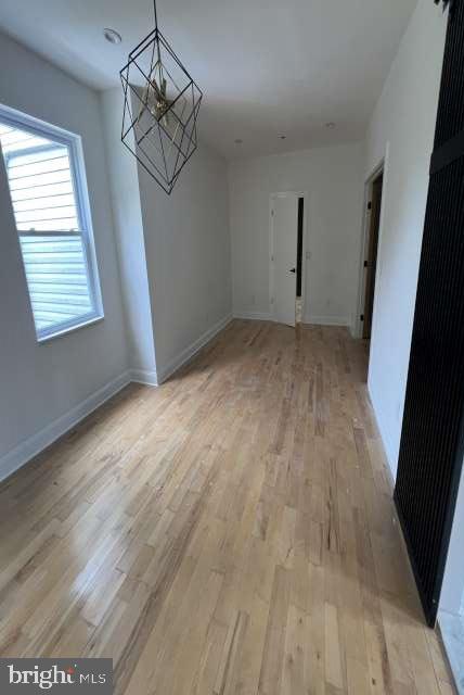 439 Erial Road Sicklerville, NJ 08081 - Photo 16 of 20 a view of empty room with wooden floor and fan