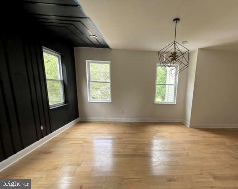 439 Erial Road Sicklerville, NJ 08081 - Photo 18 of 20 a view of empty room with wooden floor and fan