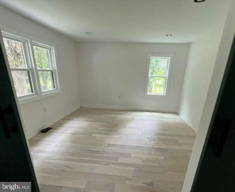 439 Erial Road Sicklerville, NJ 08081 - Photo 7 of 20 a view of an empty room with a window