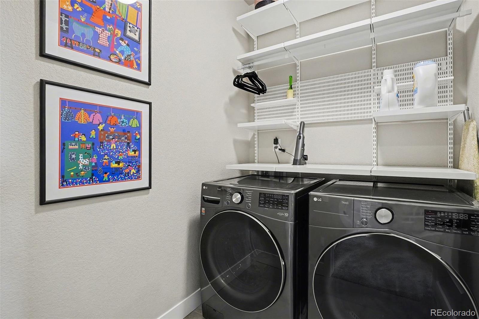 6793 Canosa Street Denver, CO 80221 - Photo 26 of 34 a utility room with dryer and washer