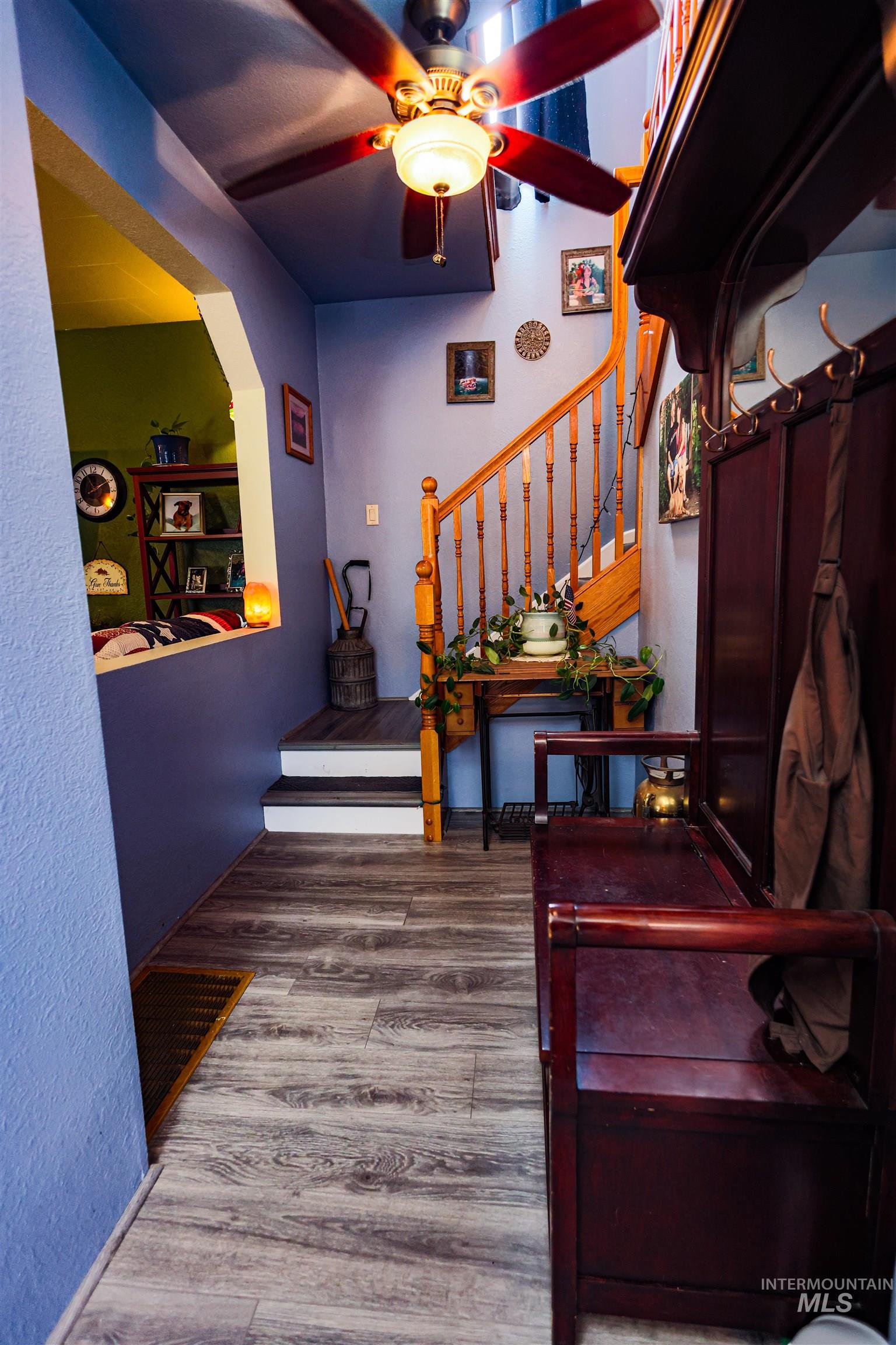 804 Maple Street Kamiah, ID 83536 - Photo 23 of 50 Stairway featuring wood finished floors and ceiling fan