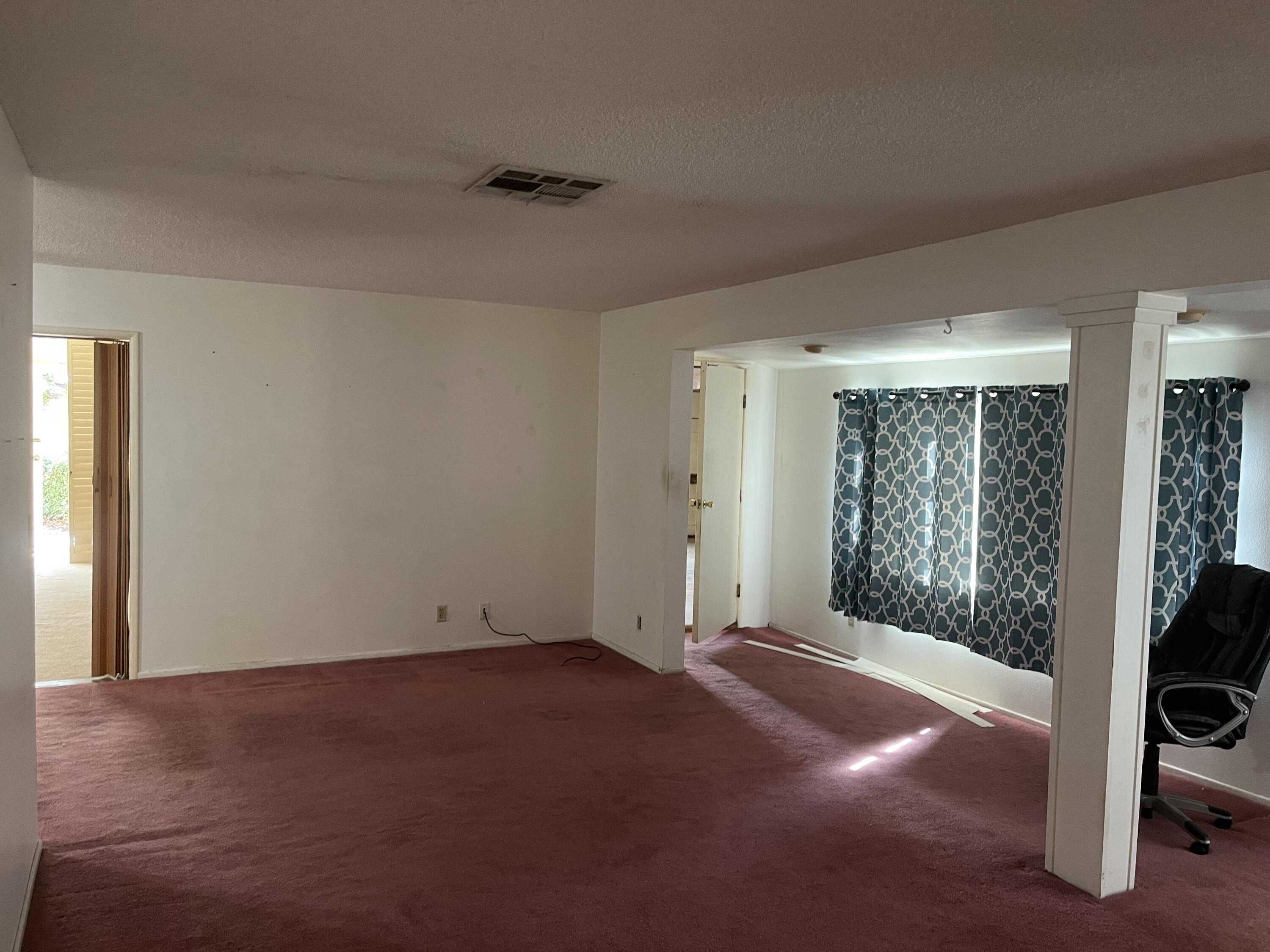 37520 Da Vall Drive Rancho Mirage, CA 92270 - Photo 11 of 23 a view of an empty room with wooden floor