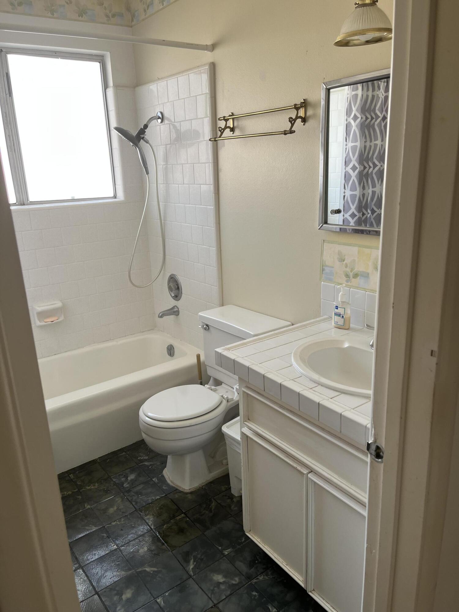 37520 Da Vall Drive Rancho Mirage, CA 92270 - Photo 13 of 23 a bathroom with a granite countertop sink toilet and shower
