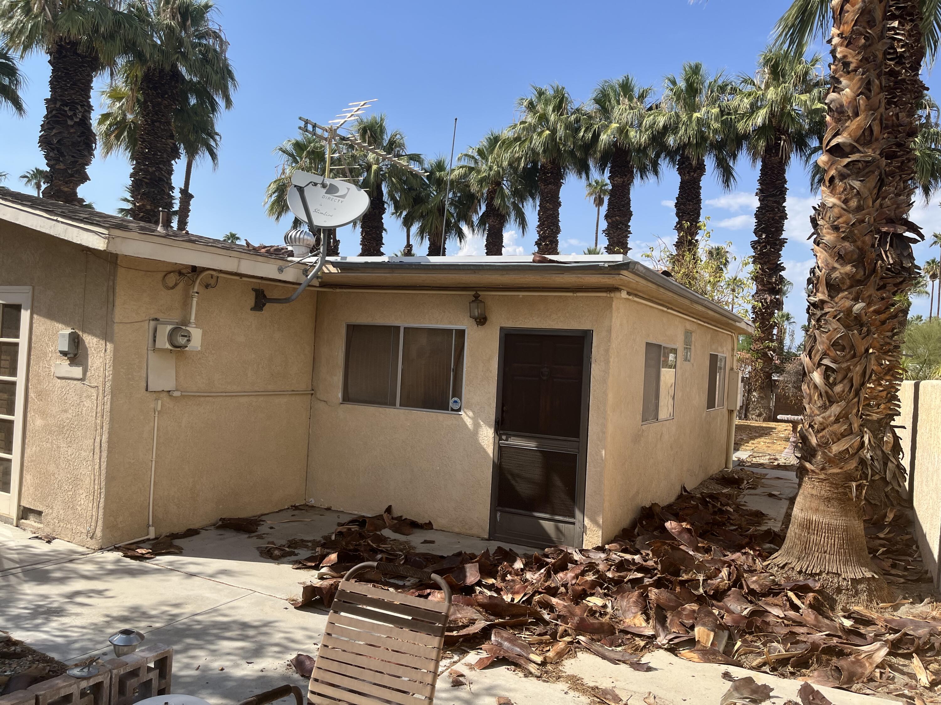 37520 Da Vall Drive Rancho Mirage, CA 92270 - Photo 20 of 23 a view of a house with a backyard