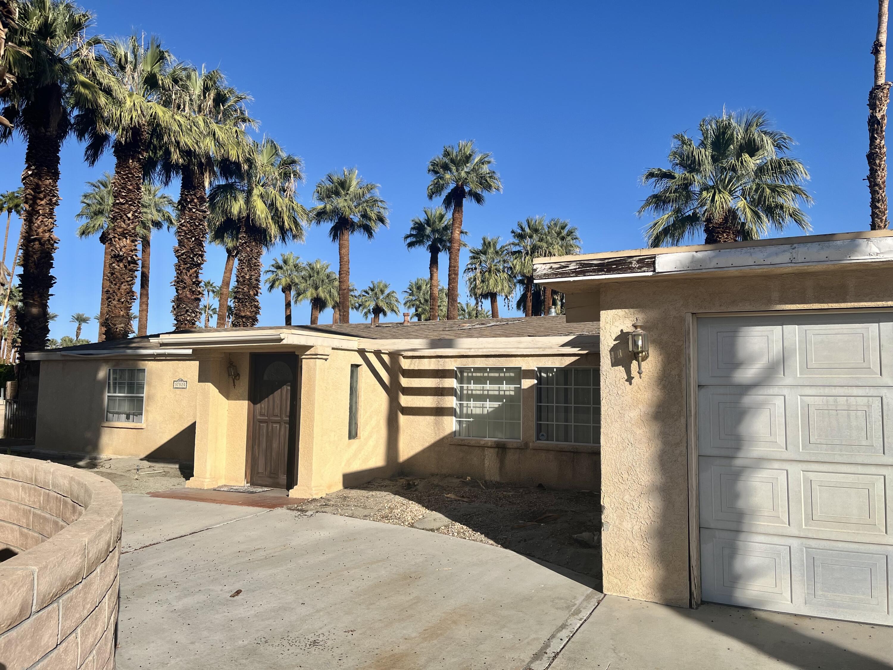 37520 Da Vall Drive Rancho Mirage, CA 92270 - Photo 2 of 23 a view of a outdoor space with swimming pool