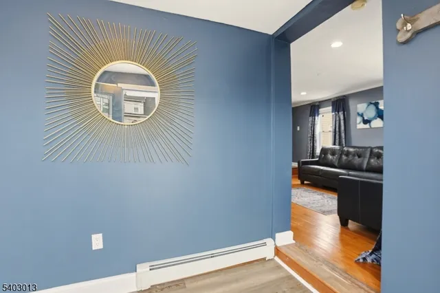 a view of a livingroom with wooden floor