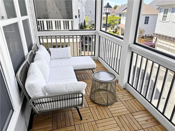 a room with pool table and windows