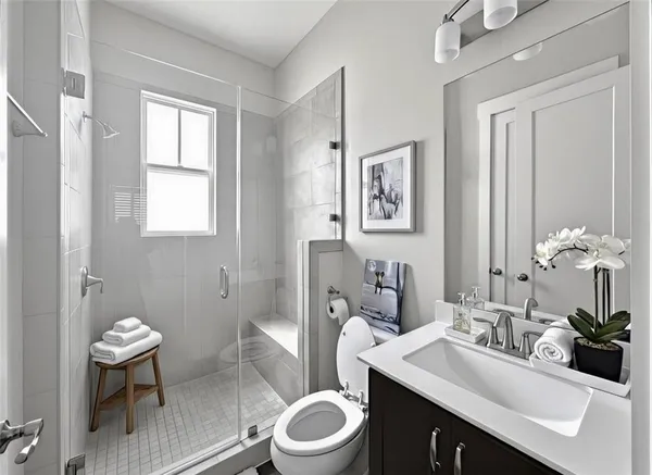 a spacious bedroom with a bed a painting on the wall and a window