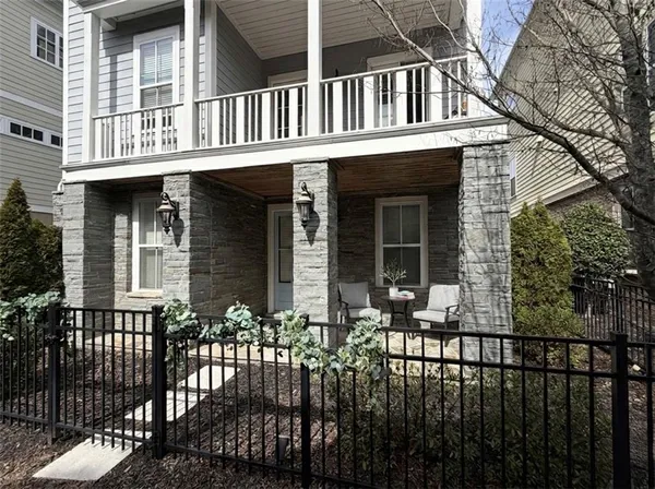 a front view of a house with a porch