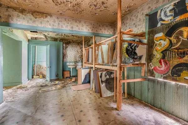 a view of a room with rack on the wall