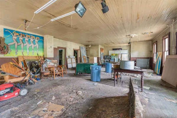 a view of a dining room with gym equipment