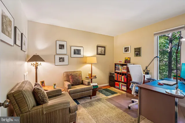 a bathroom with a sink mirror vanity and toilet