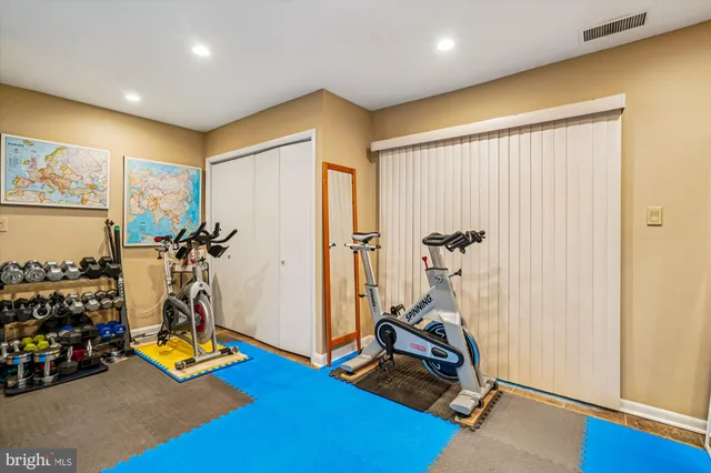 a picture of a bench in a white building