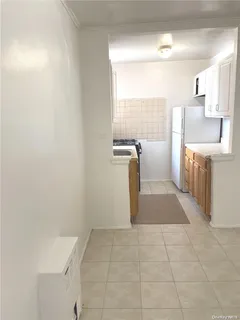 a view of a kitchen with a sink