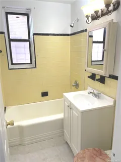 a bathroom with a sink and a bathtub