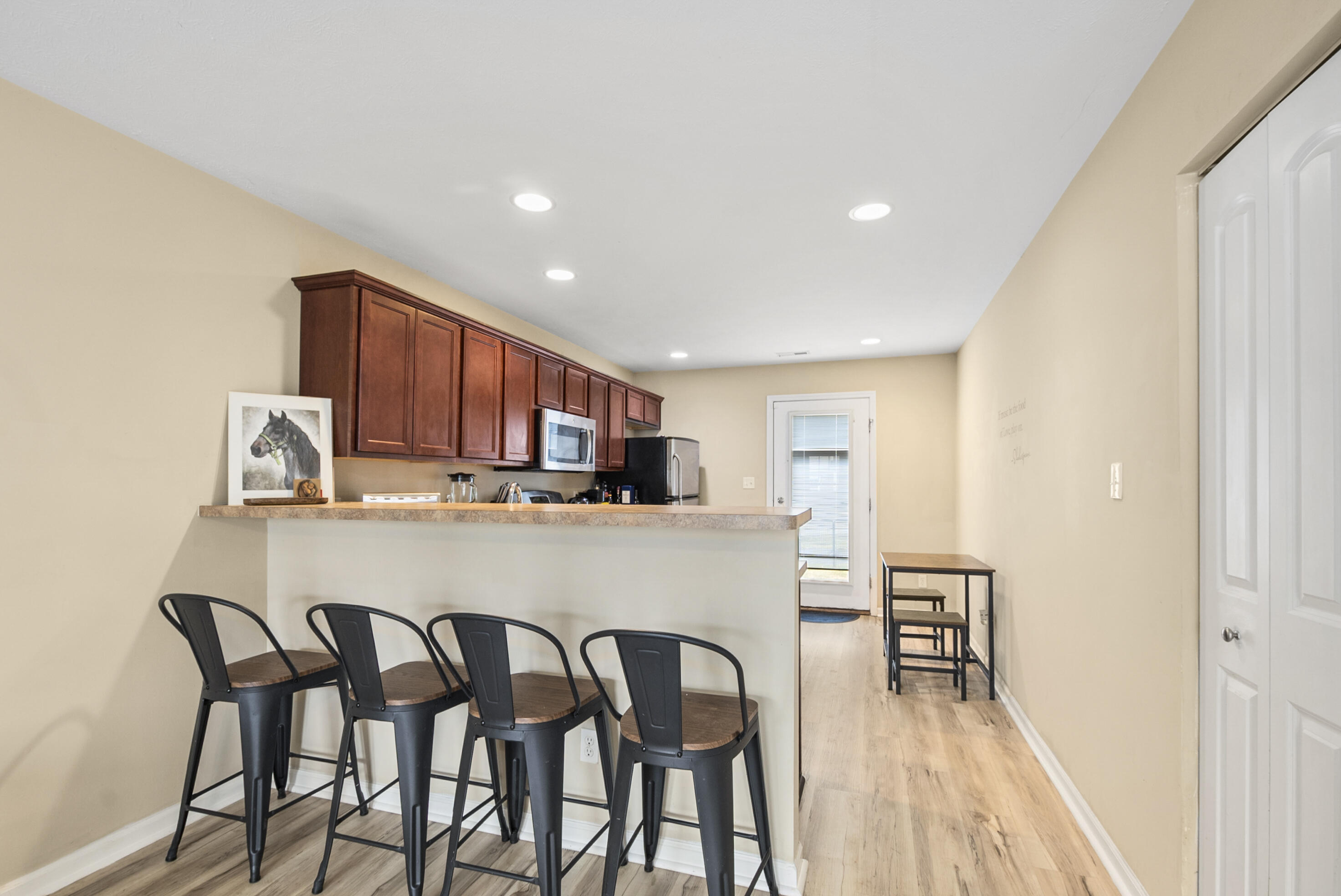 14019 Paramount Way Cedar Lake, IN 46303 - Photo 4 of 11 a kitchen with a table and chairs in it