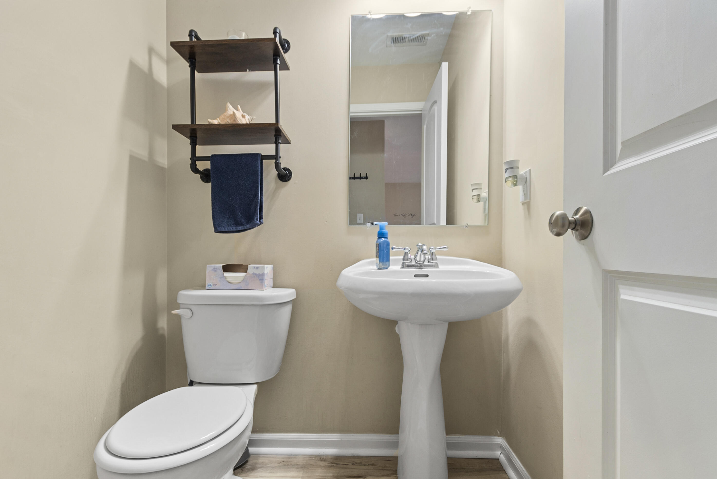 14019 Paramount Way Cedar Lake, IN 46303 - Photo 6 of 11 a bathroom with a toilet sink and mirror