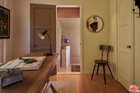 a bed room with a bed and a window