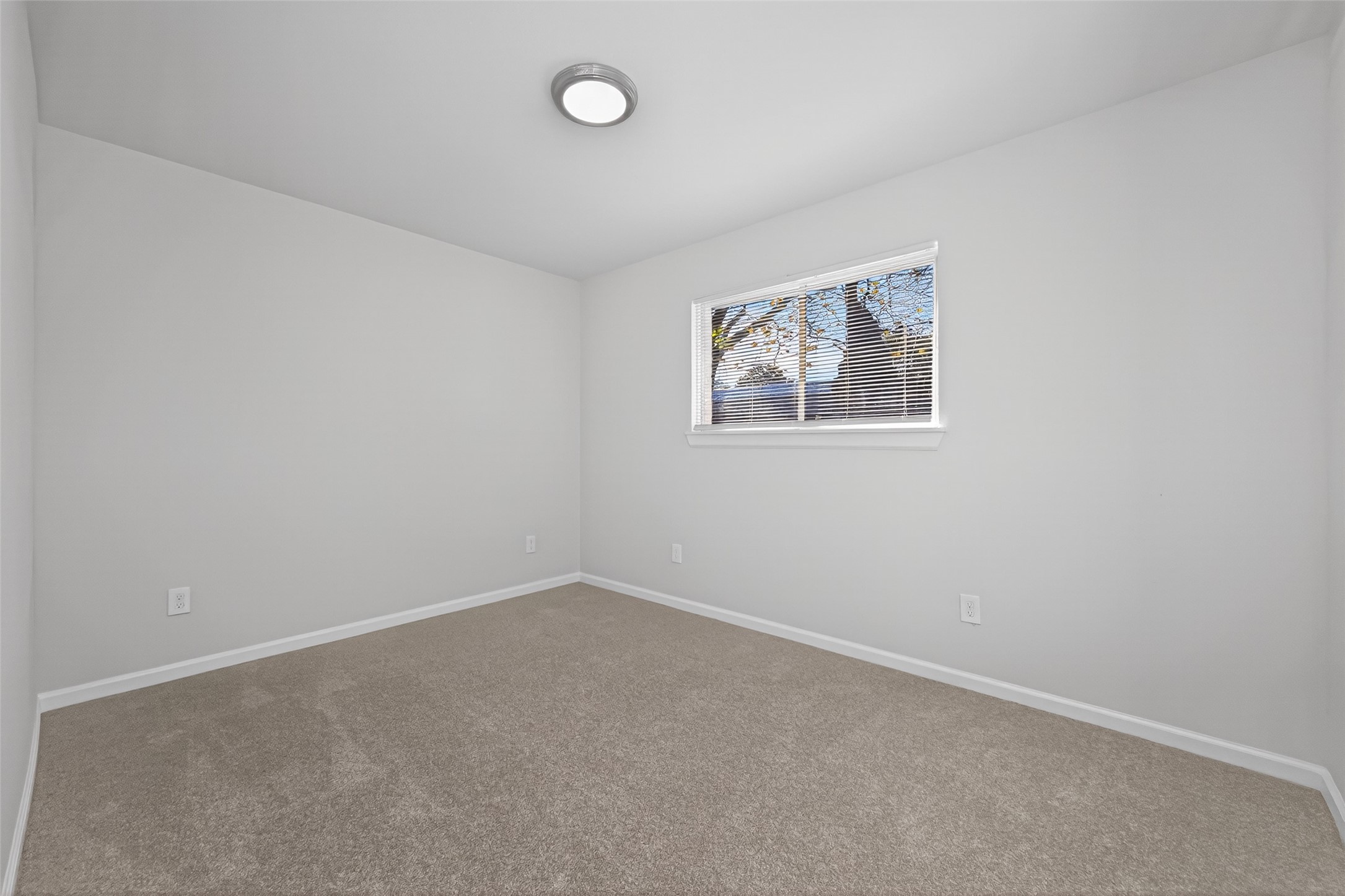 1238 Hopper Road Houston, TX 77037 - Photo 19 of 40 an empty room with a window