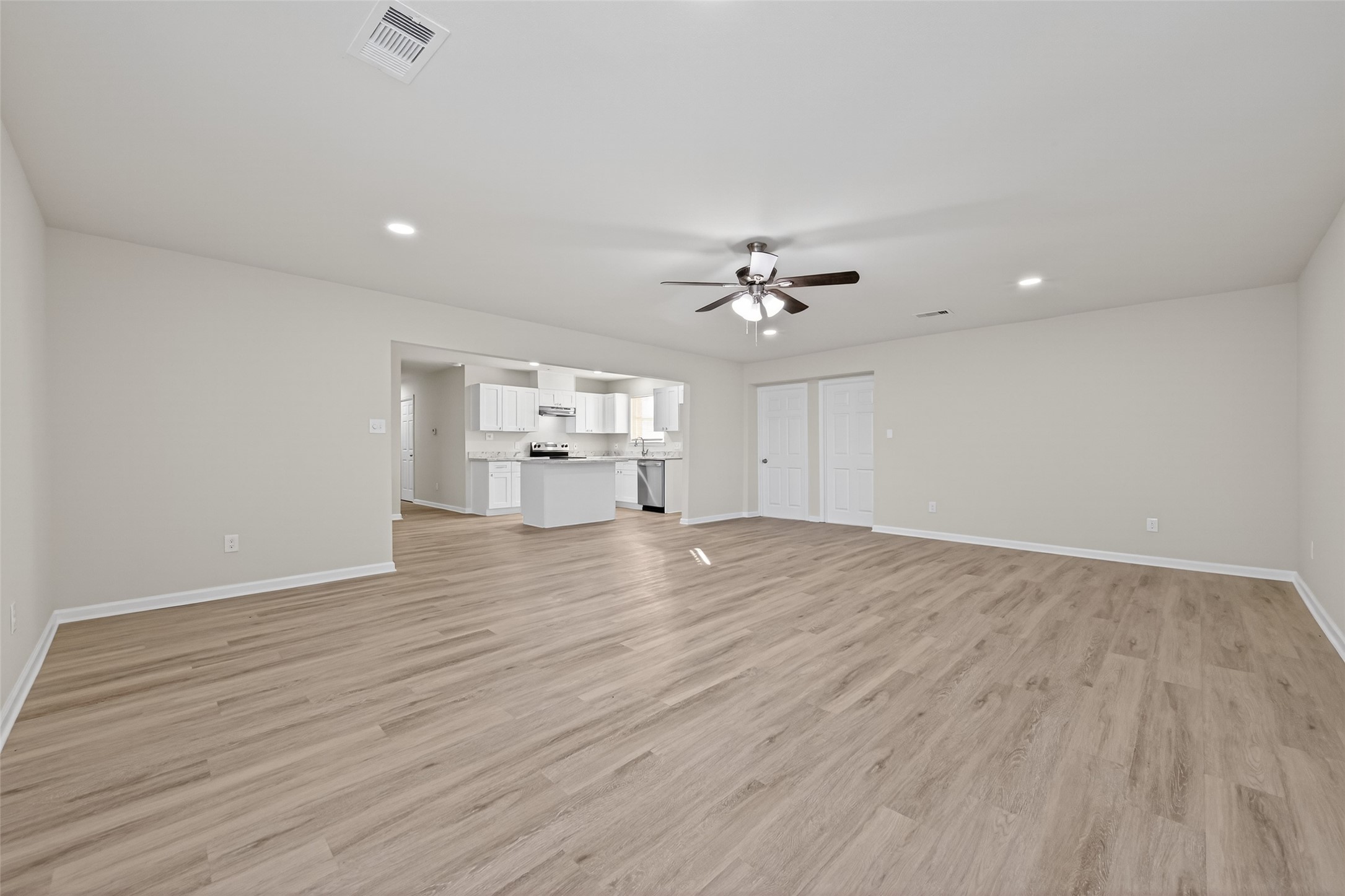 1238 Hopper Road Houston, TX 77037 - Photo 25 of 40 a view of empty room with wooden floor