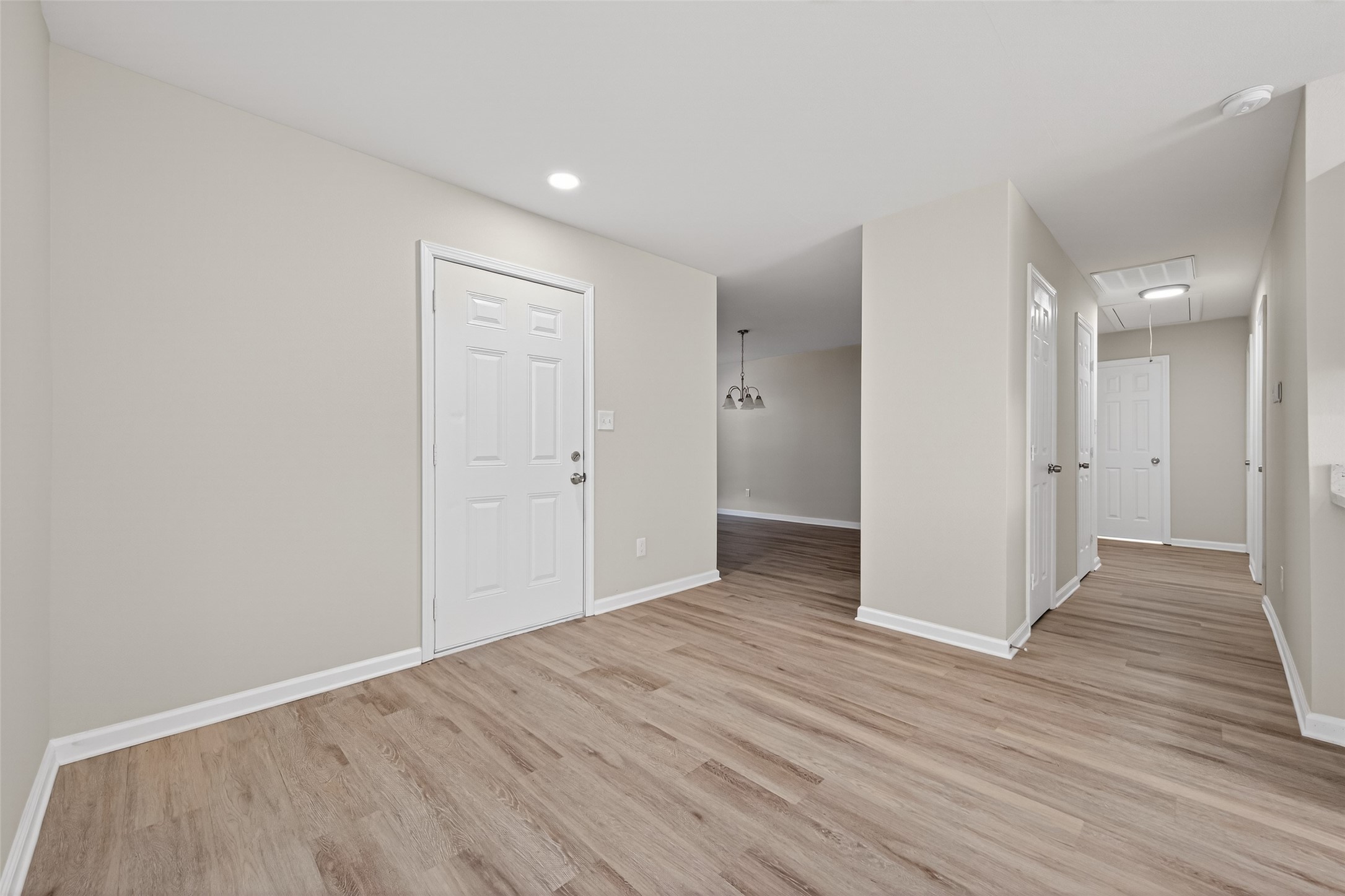 1238 Hopper Road Houston, TX 77037 - Photo 35 of 40 a view of a hallway with wooden floor