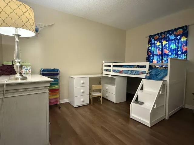 a room with furniture and a chandelier