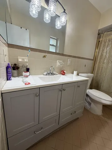 a utility room with a sink dryer and washer
