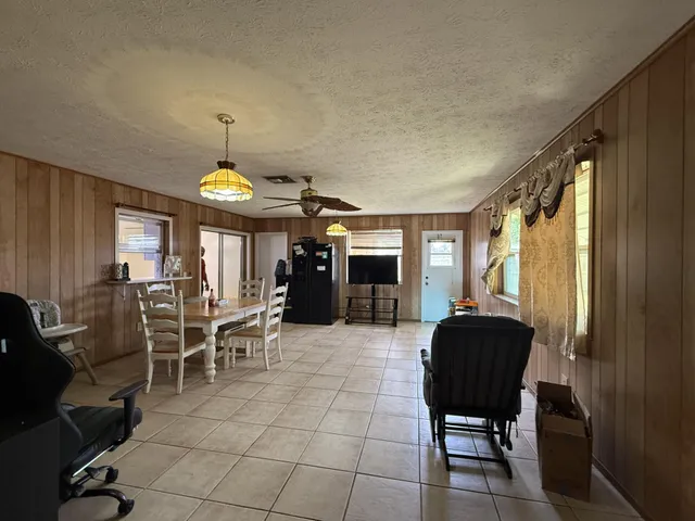 a view of a livingroom with furniture and window