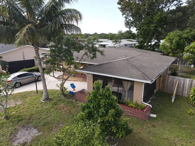 a car parked in front of a house