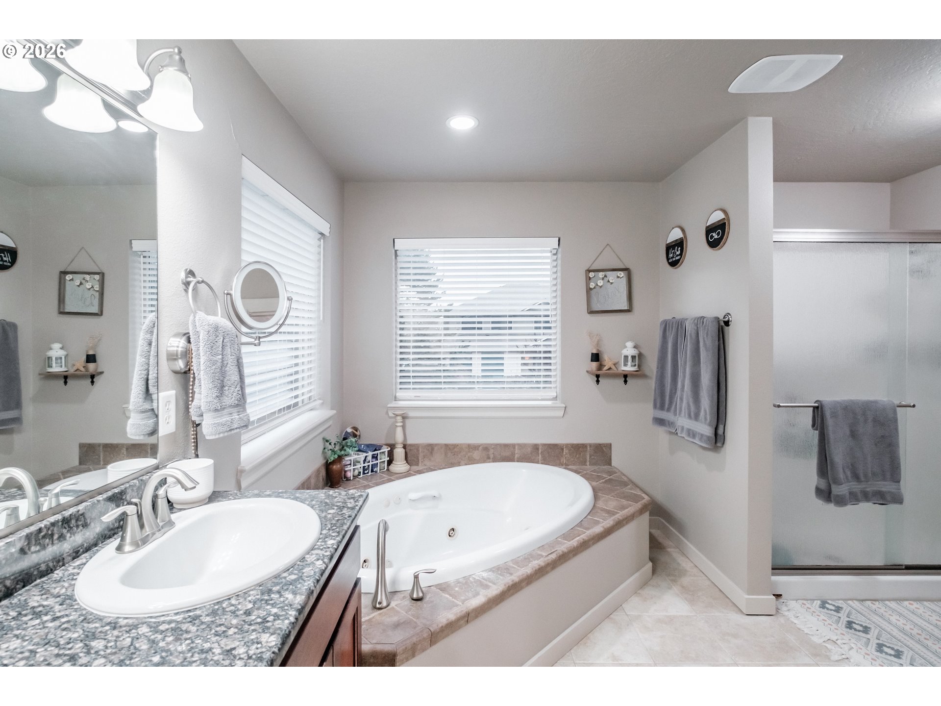 1000 Tasha Way Lebanon, OR 97355 - Photo 21 of 48 a bathroom with a tub sink and mirror