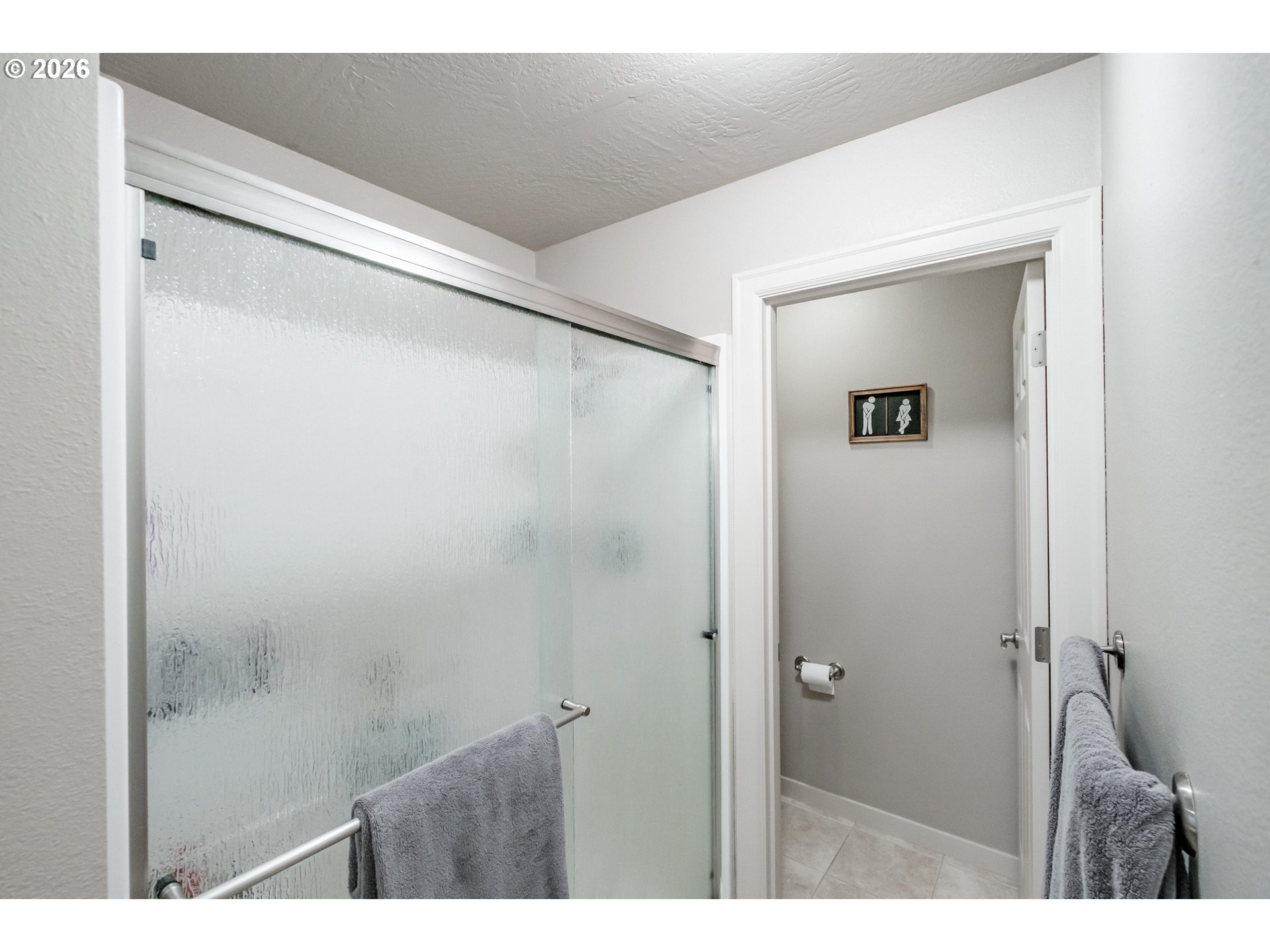 1000 Tasha Way Lebanon, OR 97355 - Photo 22 of 48 a bathroom with a shower and a sink