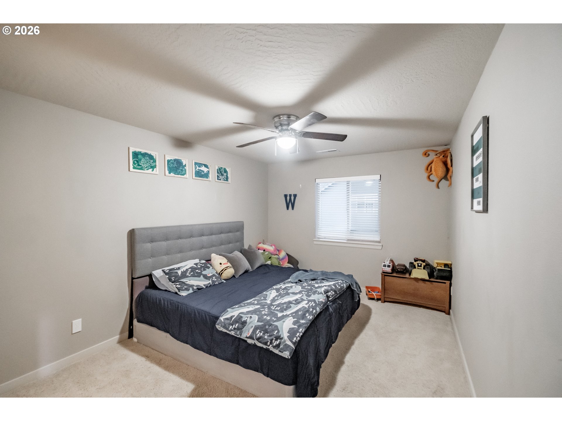1000 Tasha Way Lebanon, OR 97355 - Photo 23 of 48 a bedroom with a bed and window