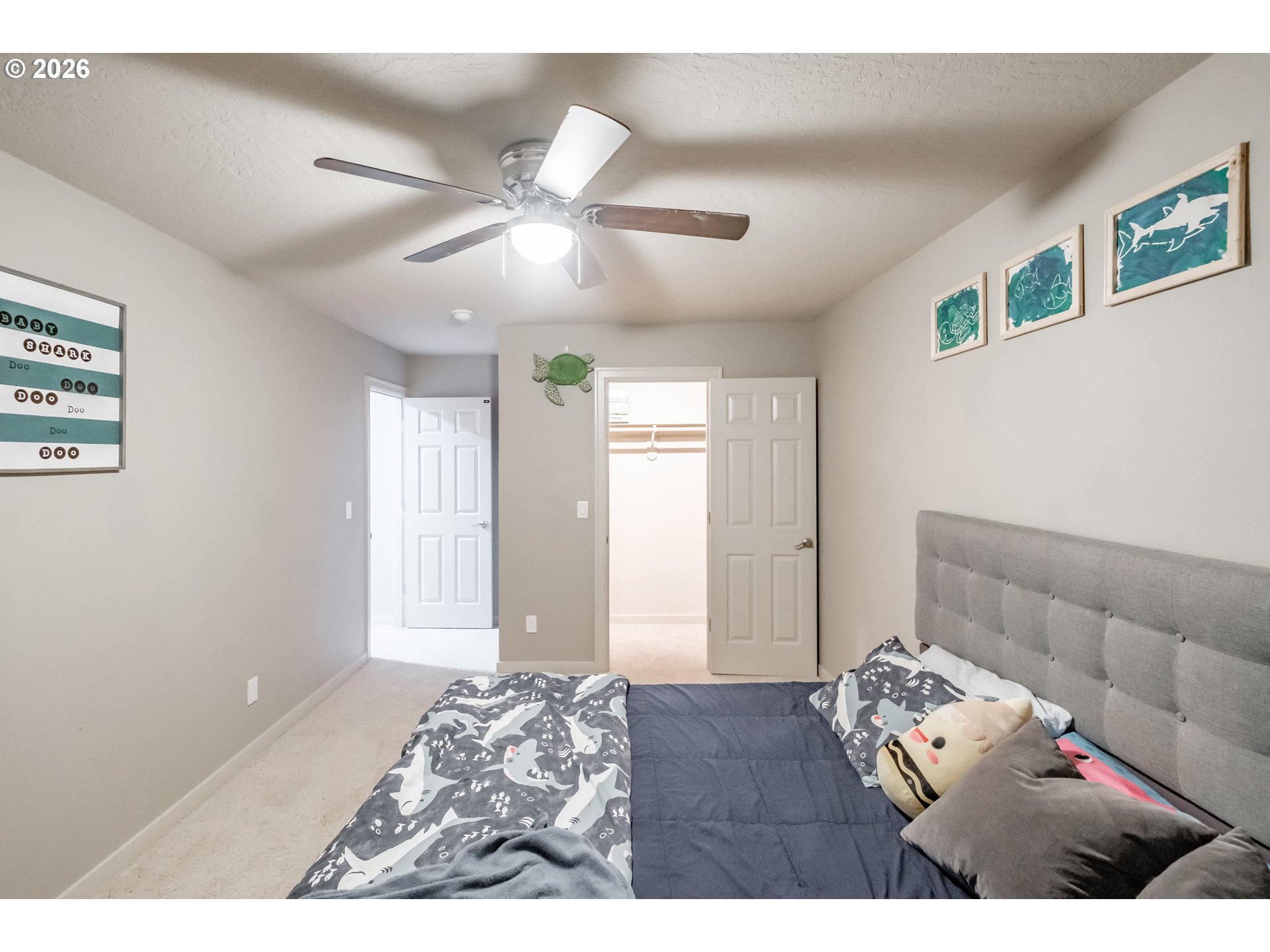 1000 Tasha Way Lebanon, OR 97355 - Photo 25 of 48 a bedroom with a bed and a chandelier
