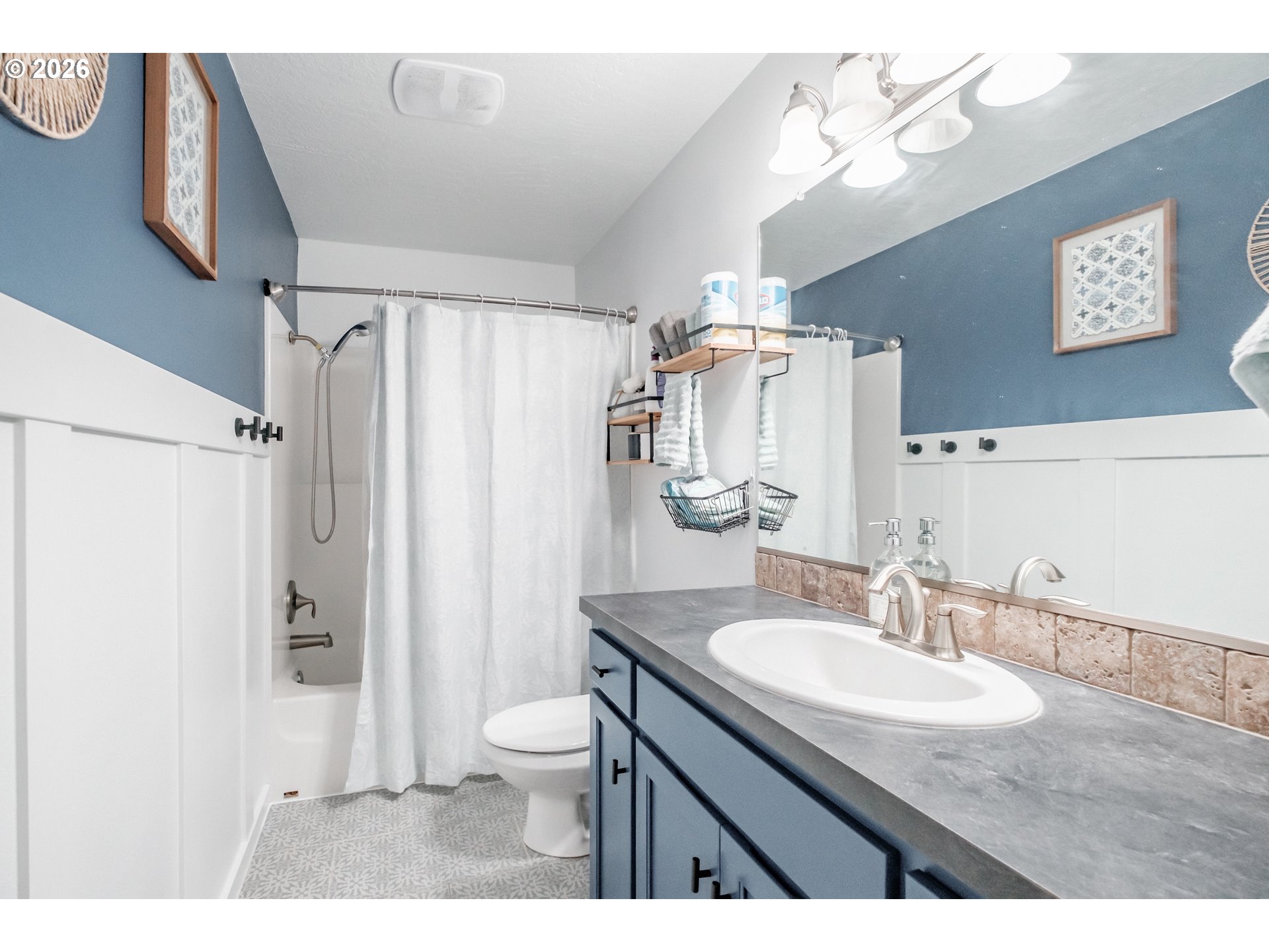 1000 Tasha Way Lebanon, OR 97355 - Photo 28 of 48 a bathroom with a granite countertop sink a toilet a mirror and shower