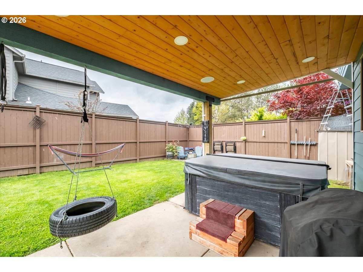 1000 Tasha Way Lebanon, OR 97355 - Photo 40 of 48 a view of a backyard with table and chairs