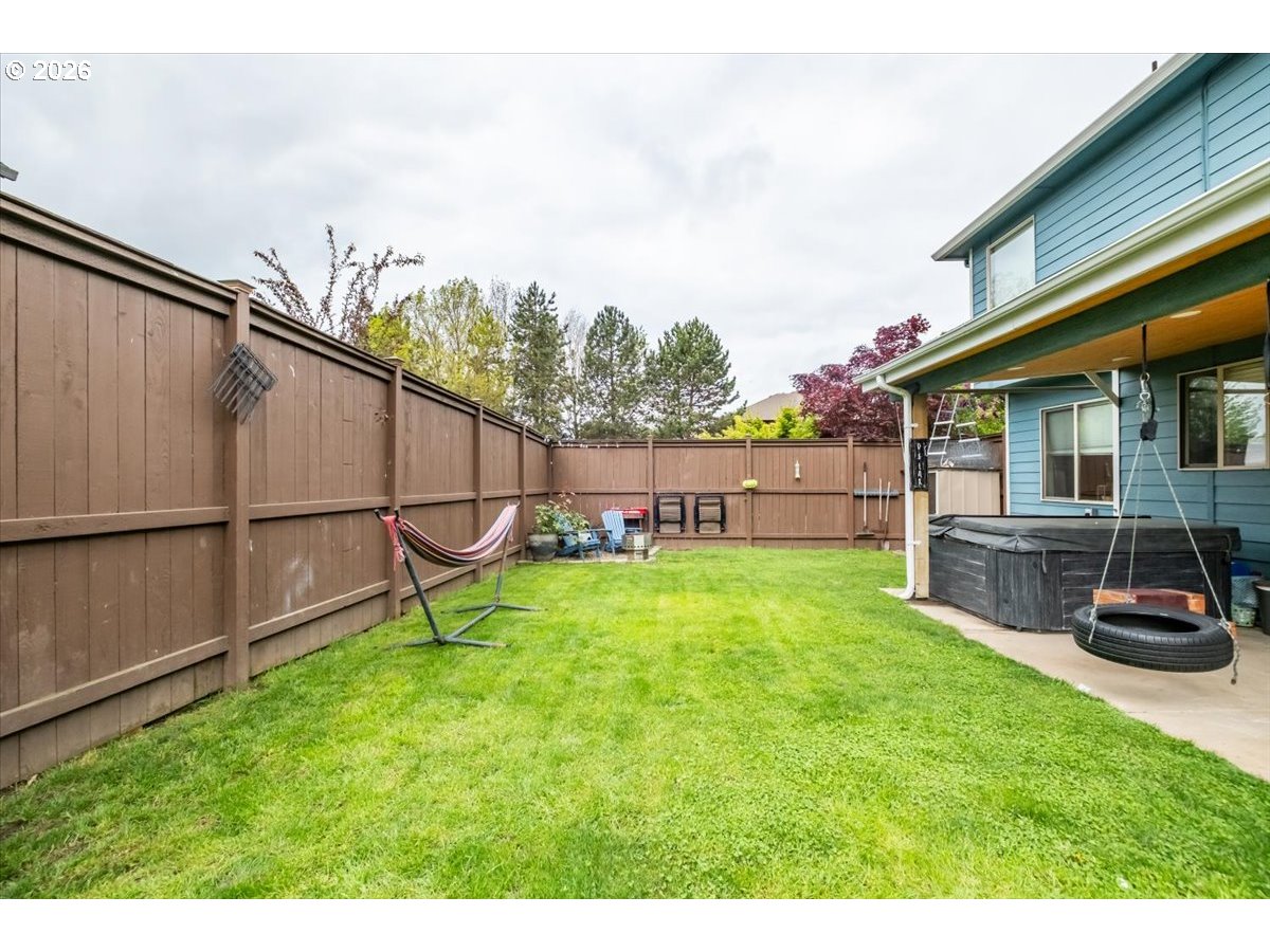 1000 Tasha Way Lebanon, OR 97355 - Photo 44 of 48 a view of an house with backyard space and sitting area