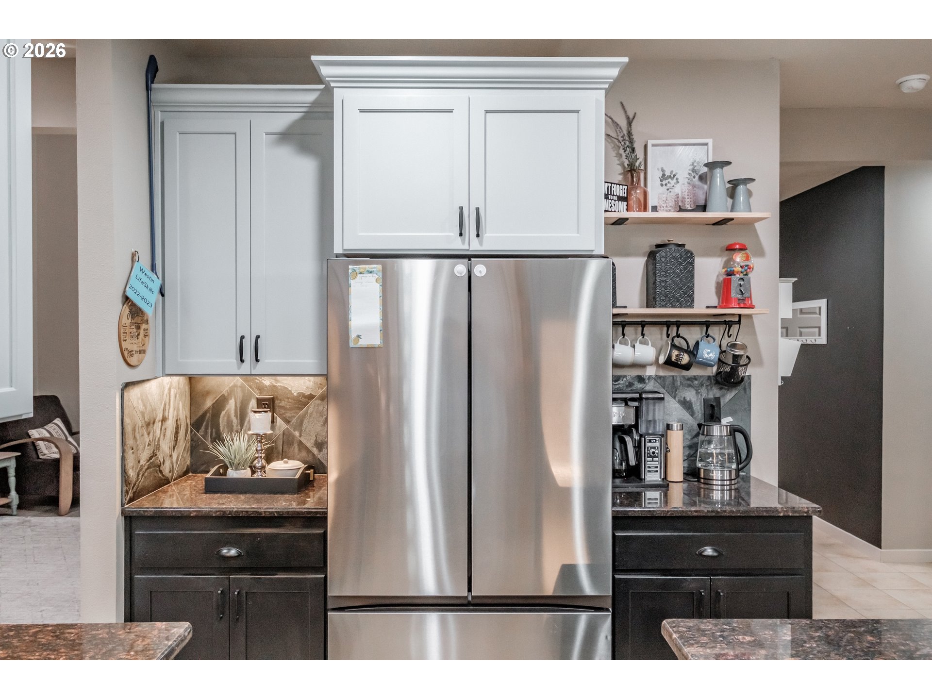 1000 Tasha Way Lebanon, OR 97355 - Photo 6 of 48 a kitchen with a refrigerator and cabinets