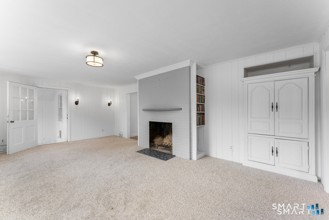 62 Chatham Road Berlin, CT 06037 - Photo 16 of 38 a view of an empty room with a fireplace