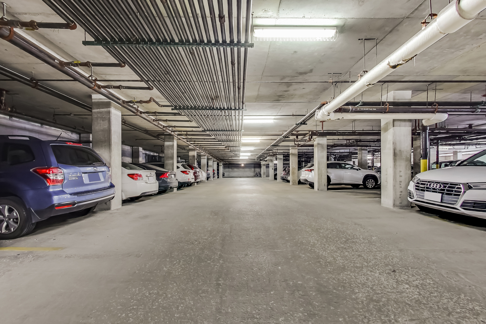 1200 West Monroe Street, Unit 511 Chicago, IL 60607 - Photo 11 of 12 a view of cars parked in a parking
