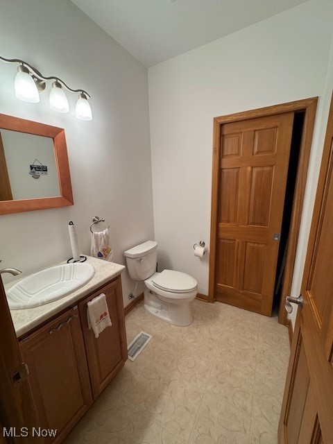 38332 Beachview Road Willoughby, OH 44094 - Photo 29 of 42 Half Bathroom featuring vanity and access to storage room