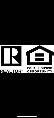 a upper view of whole floor with a black and white wall