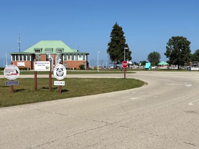 a kitchen with a sink stainless steel appliances and cabinets