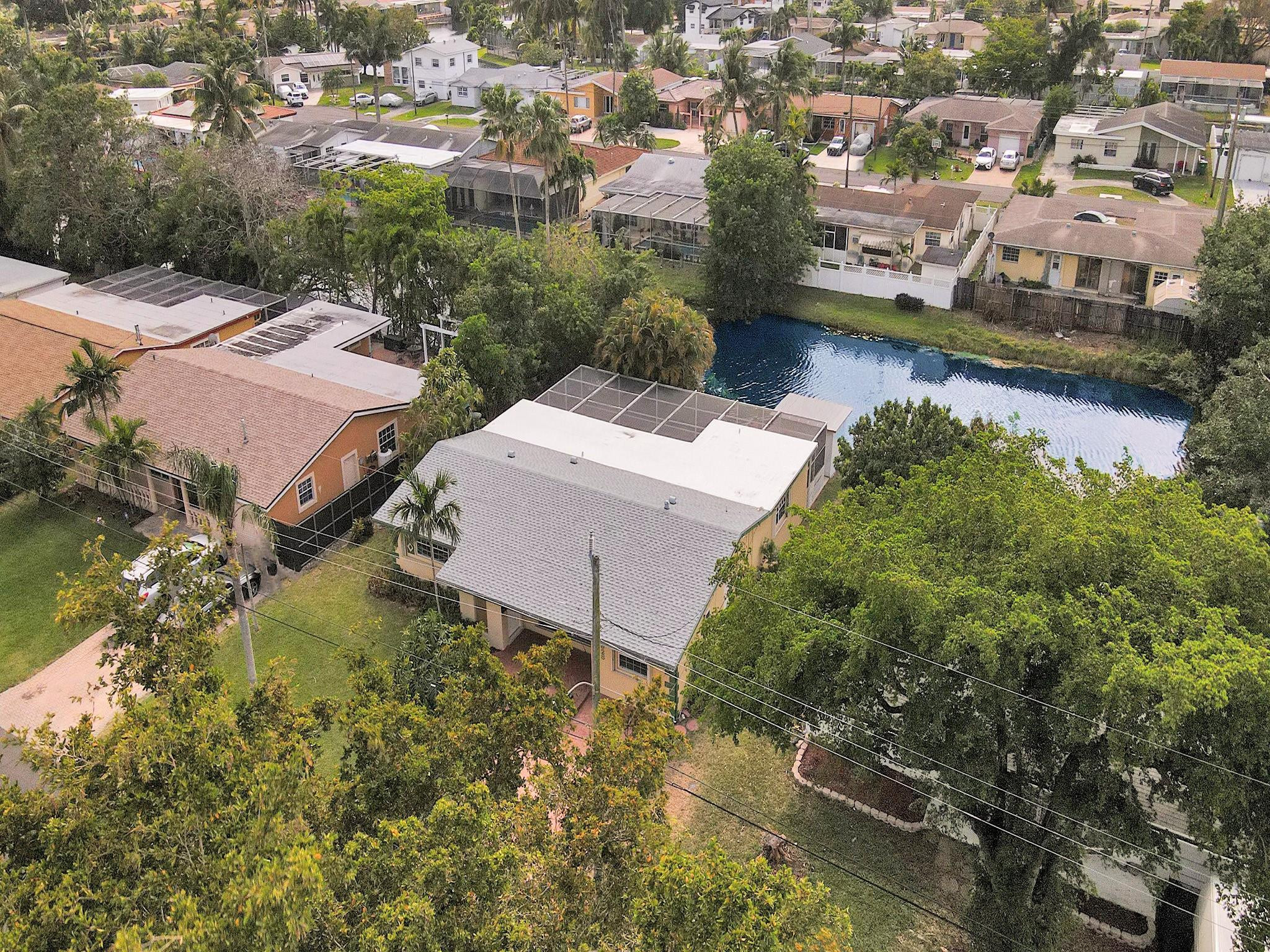 3828 East Shore Road Miramar, FL 33023 - Photo 3 of 33 an aerial view of residential houses with outdoor space