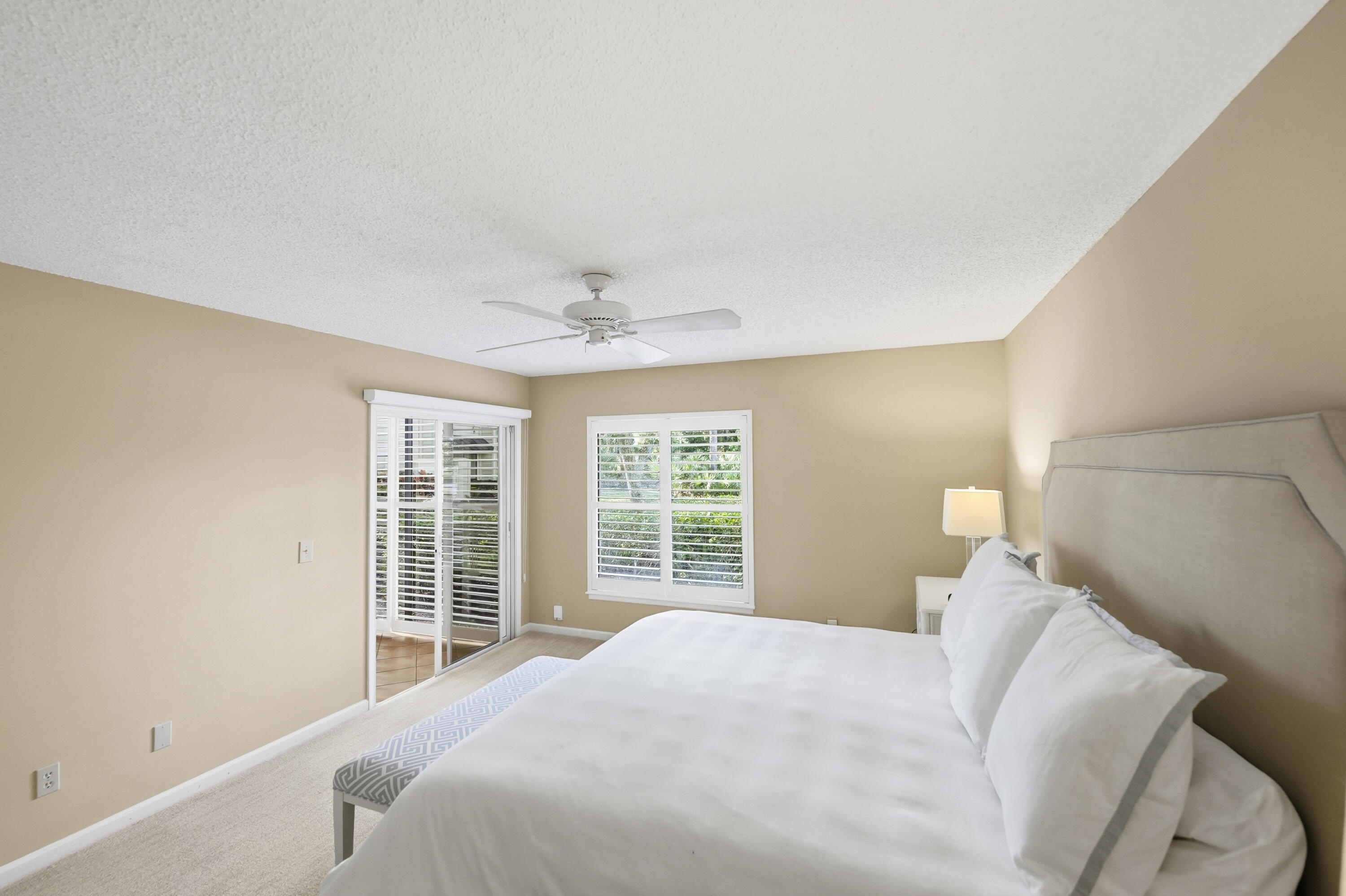 6404 Southeast Brandywine Court, Unit 104 Stuart, FL 34997 - Photo 19 of 57 Primary Bedroom