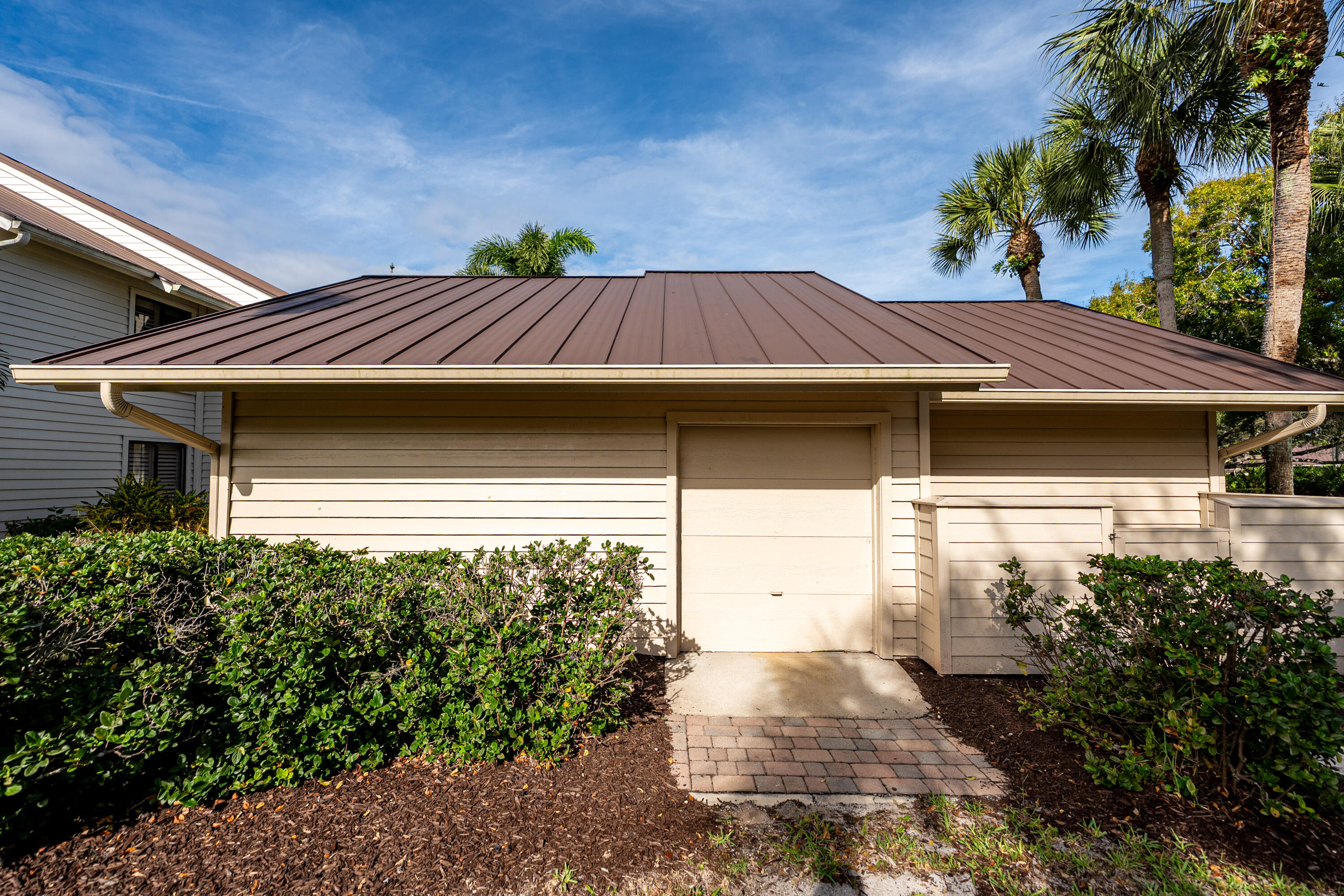 6404 Southeast Brandywine Court, Unit 104 Stuart, FL 34997 - Photo 34 of 57 1 Car Garage