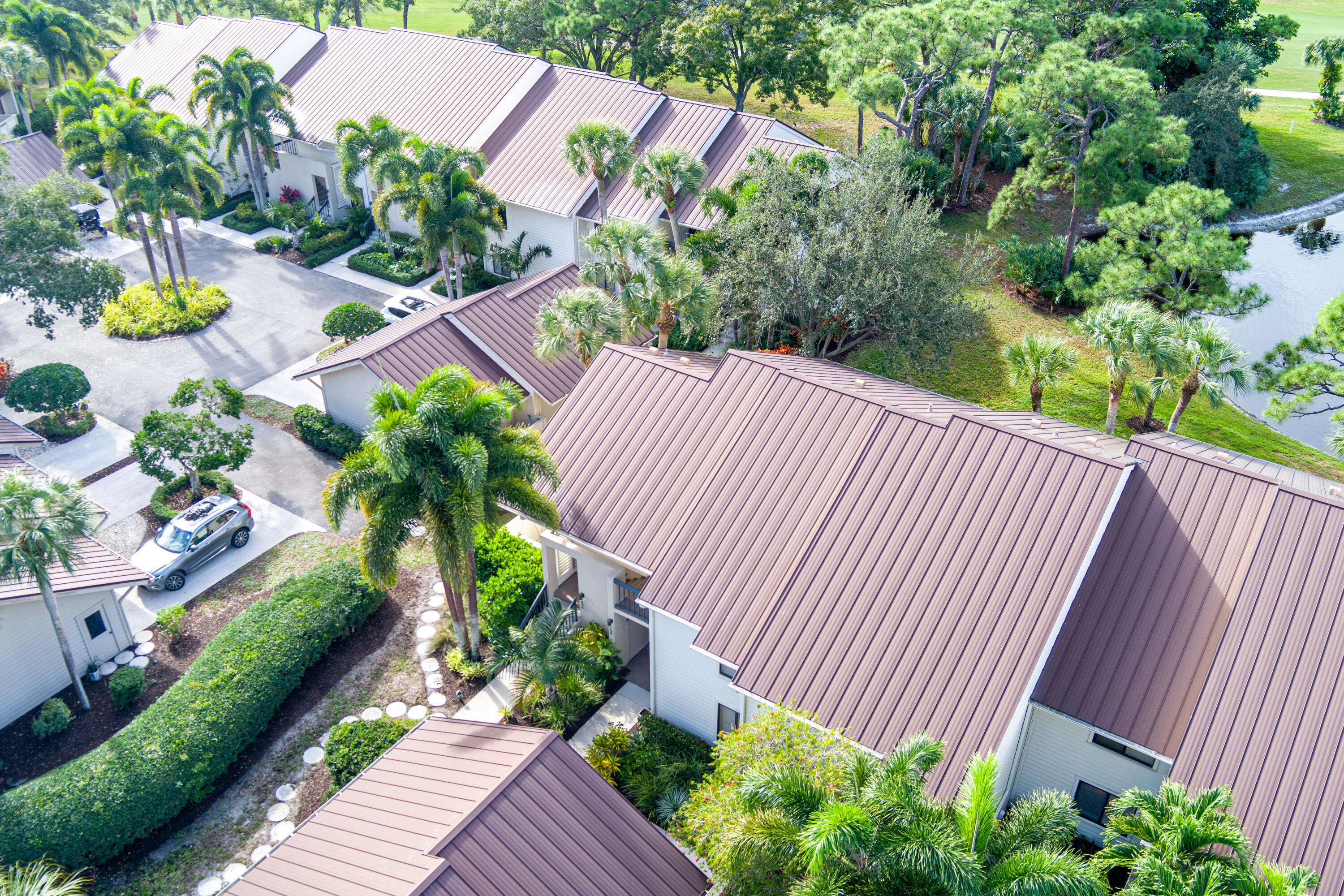6404 Southeast Brandywine Court, Unit 104 Stuart, FL 34997 - Photo 39 of 57 Condo Entrance Drone